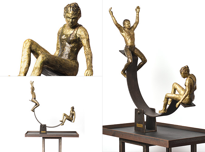 Figuras en bronce y subibaja en fierro | 73cms x 68cms x 23cms